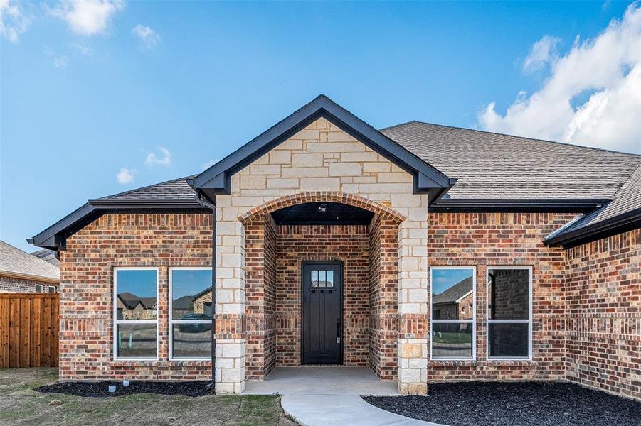 Front exterior of a new home in , Mabank, TX, highlighting curb appeal (Image 20).