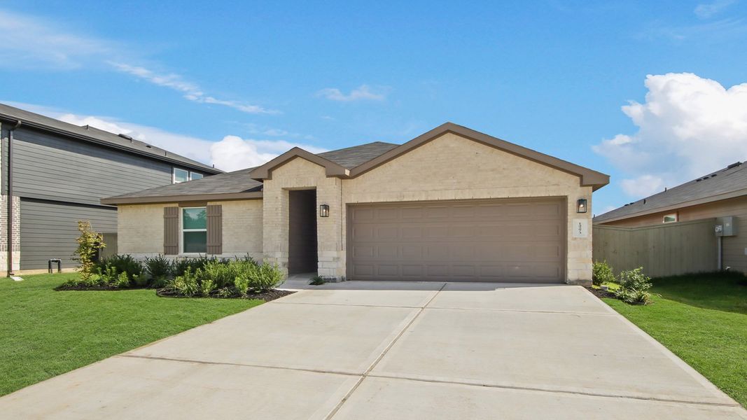 Front exterior of a new home in Harrington Trails at The Canopies, Splendora, TX, highlighting curb appeal (Image 1). Front exterior of a new home in Harrington Trails at The Canopies, Splendora, TX, highlighting curb appeal (Image 1).