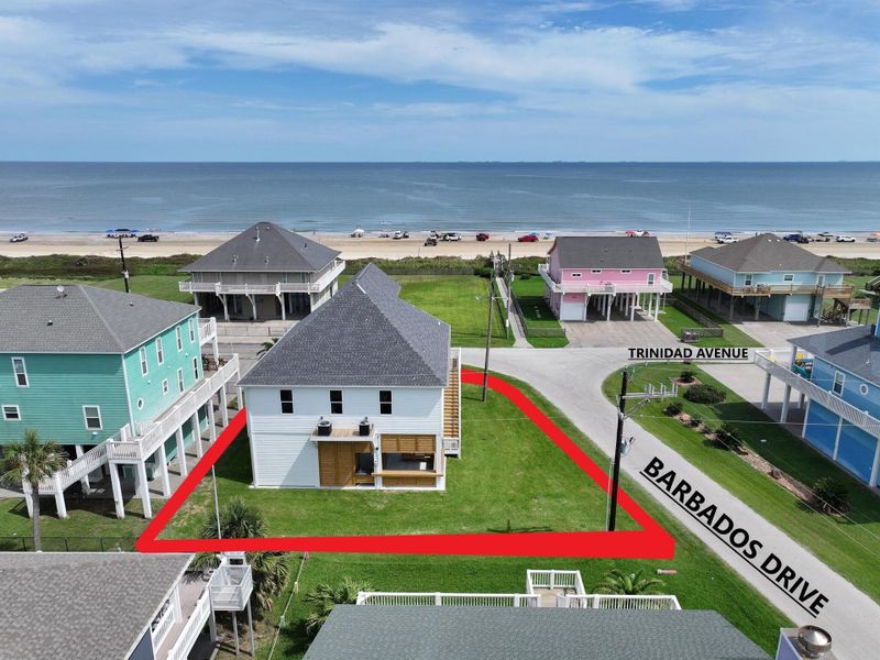 Front exterior of a new home in , Bolivar Peninsula, TX, highlighting curb appeal (Image 1). Front exterior of a new home in , Bolivar Peninsula, TX, highlighting curb appeal (Image 1).