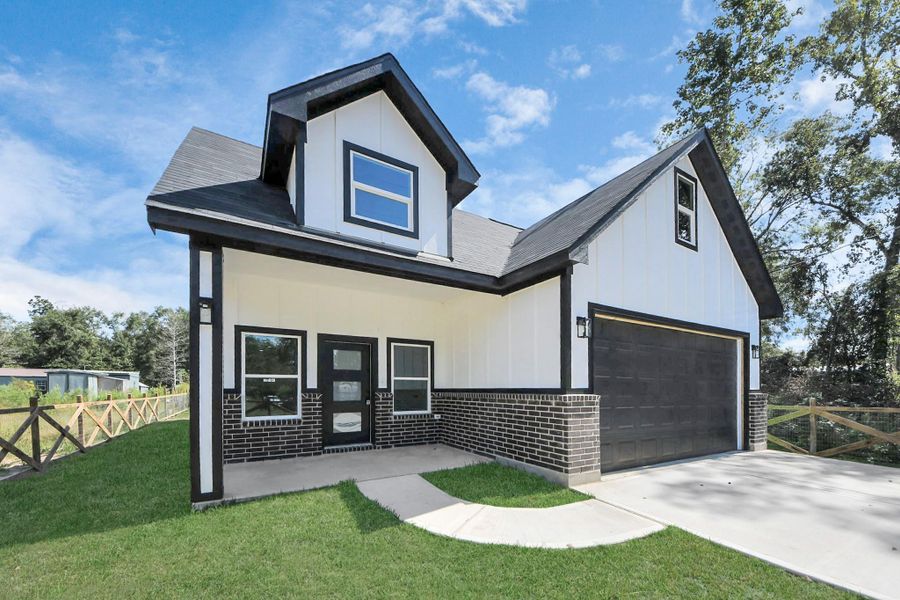Front exterior of a new home in , Splendora, TX, highlighting curb appeal (Image 12).