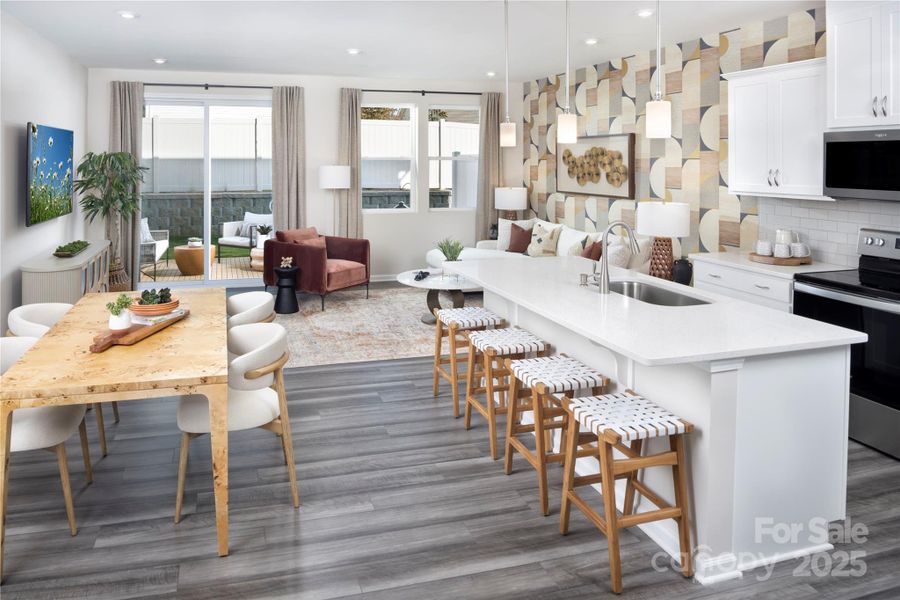 Open & Light & Bright- Kitchen/Breakfast/Gathering-Adriana Decorated Model Home-like subject property