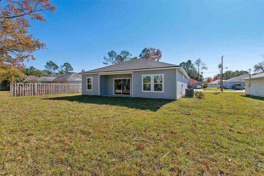 Exterior details and patio area of a home in Palm Coast, Palm Coast (Image 20).