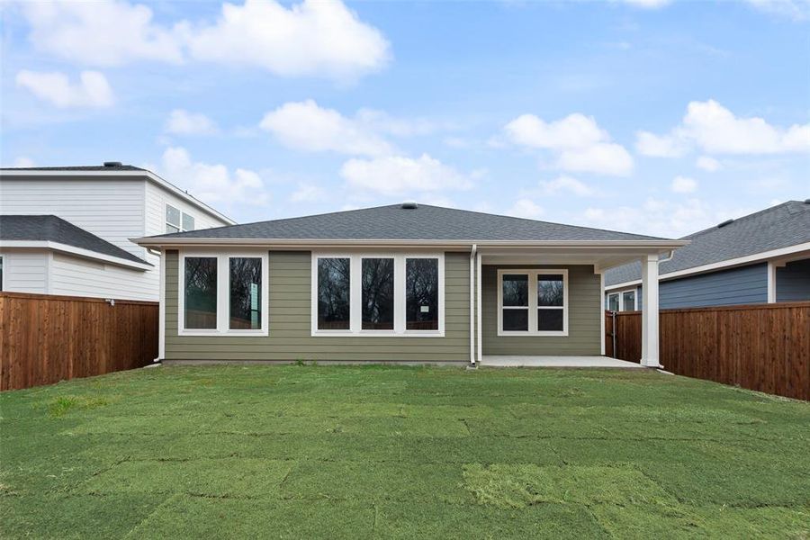 Exterior details and patio area of a home in Creekside of Crowley, Crowley (Image 3).