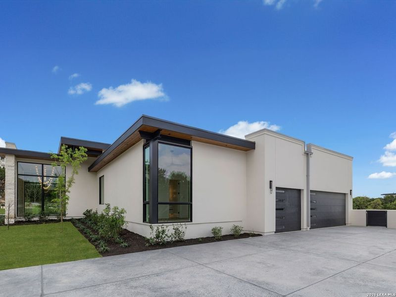 Front exterior of a new home in , San Antonio, TX, highlighting curb appeal (Image 26). Front exterior of a new home in , San Antonio, TX, highlighting curb appeal (Image 26).