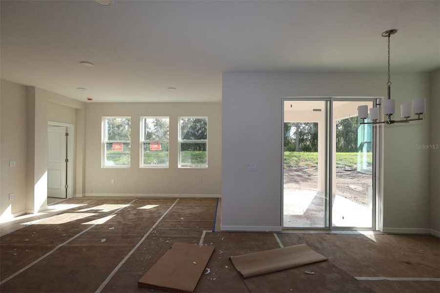 In-progress construction of a new home in Eden at Crossprairie, St. Cloud, FL (Image 17).
