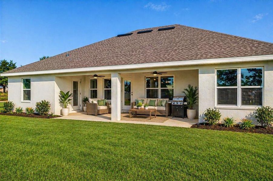 Exterior details and patio area of a home in Hill Country Estates, Dade City (Image 24).