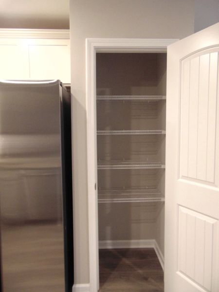 This kitchen is perfect for you to cook all your favorite dishes, the kitchen comes with steel appliances, crown cabinetry, under cabinet lighting, and plenty of cabinets for you to store all your goods.