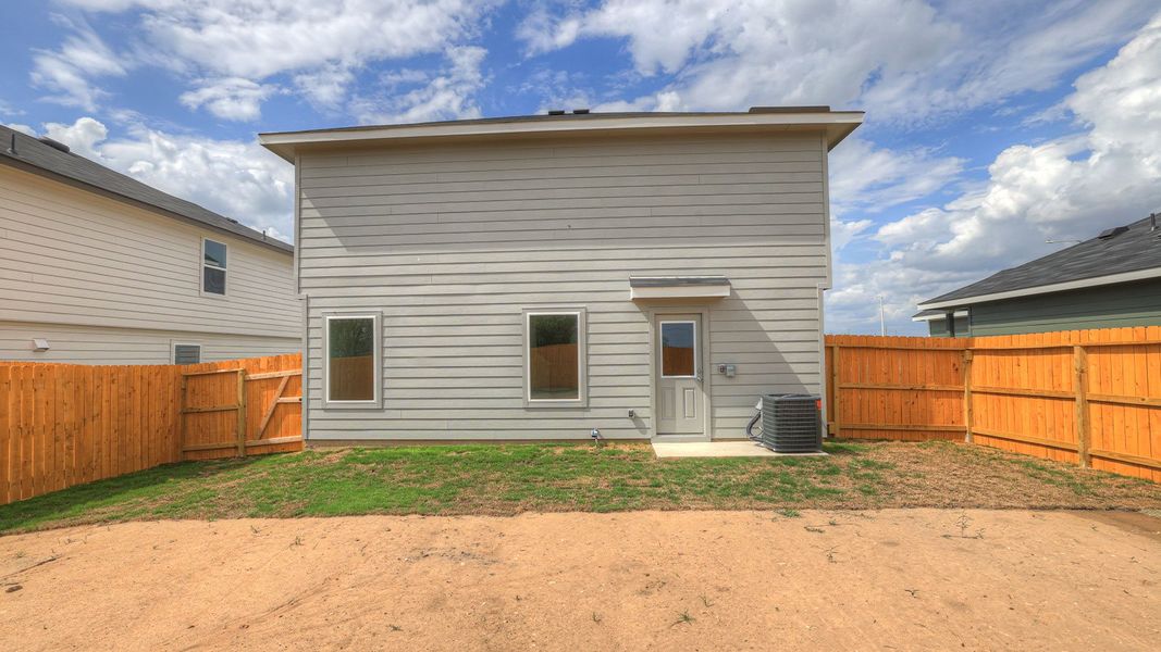 Representative exterior photo of a completed home built from the The Davis by D.R. Horton in Ladera, Luling, TX (Image 19).