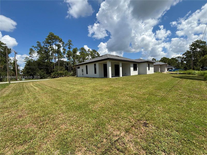 Exterior details and patio area of a home in , Lehigh Acres (Image 4).