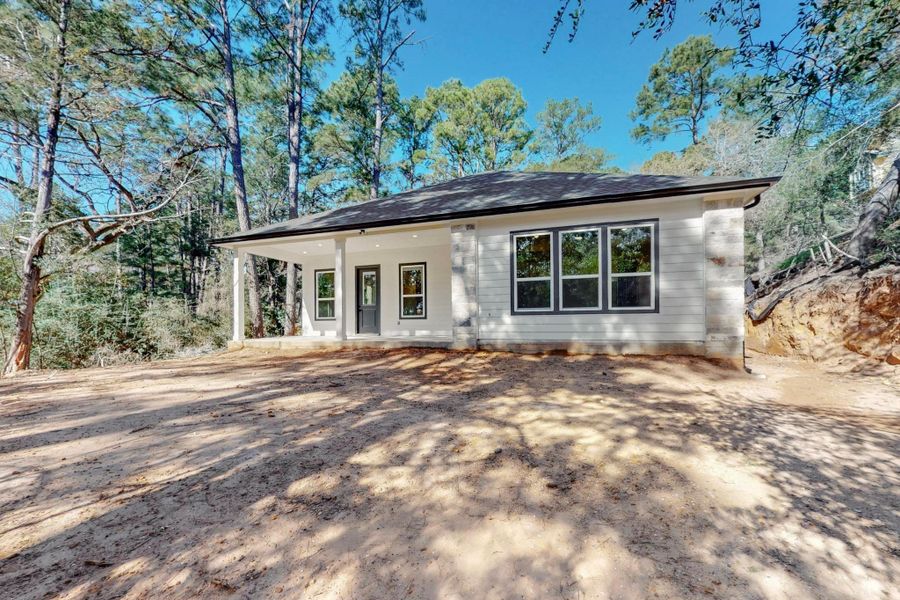 View of front of home with a patio