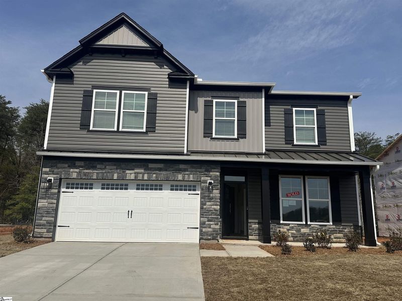 Front exterior of a new home in Shiloh Trail, Wellford, SC, highlighting curb appeal (Image 2).