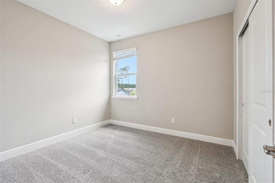 Spacious, unfurnished interior of a new home in Legends Preserve - Signature Series, Daytona Beach (Image 36).