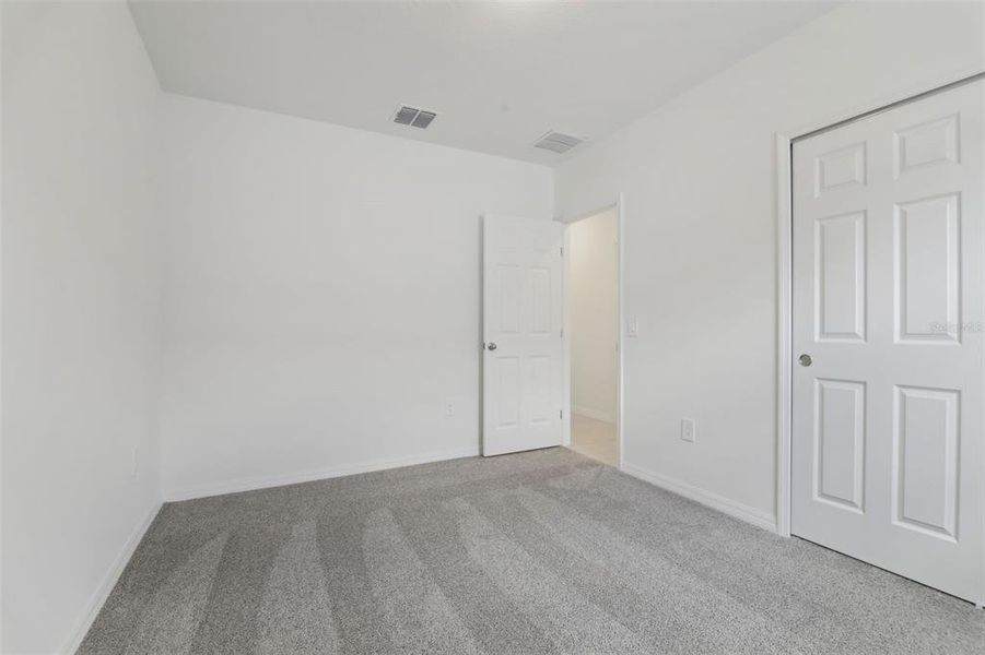 Spacious, unfurnished interior of a new home in Springs at Lake Alfred - Signature Series, Lake Alfred (Image 30).