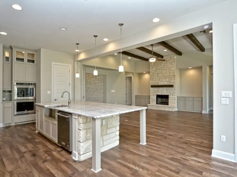 Representative furnished interior of a home built from the Santa Barbara II by Giddens Homes in Scofield Farms Estates, Georgetown (Image 7).