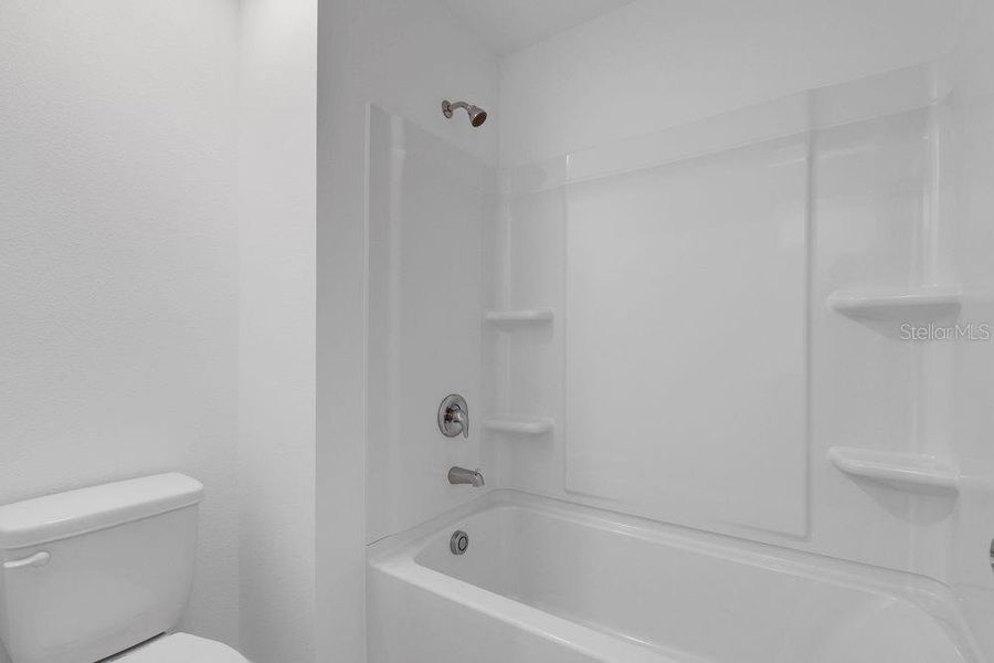 Furnished interior view inside a new home in Waterstone, Groveland (Image 30). Furnished interior view inside a new home in Waterstone, Groveland (Image 30).