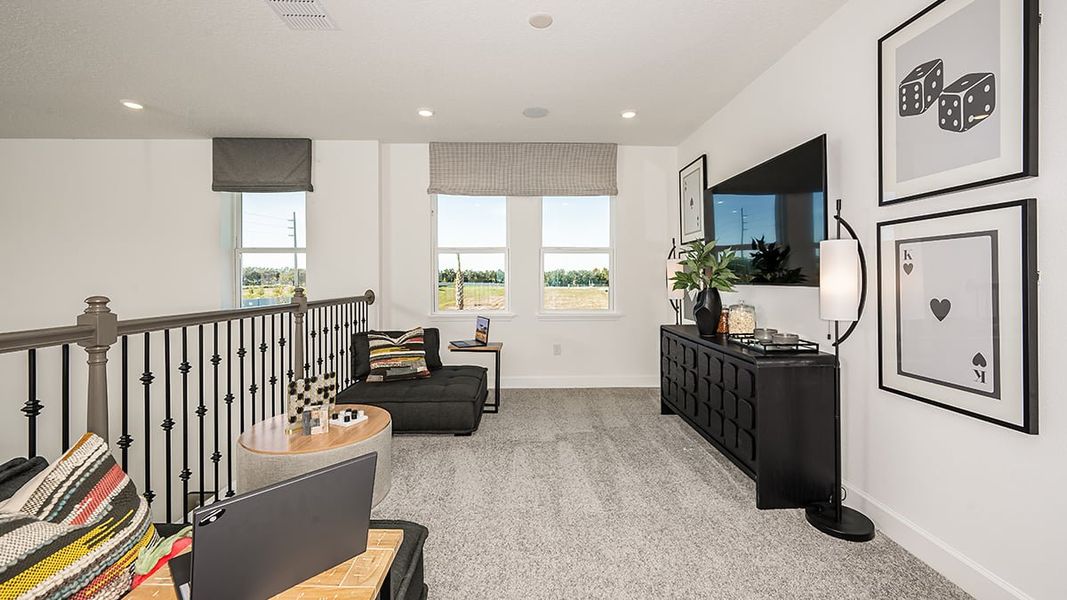 Representative furnished interior of a home built from the Anastasia by Taylor Morrison in Lochside, Mount Dora (Image 19).