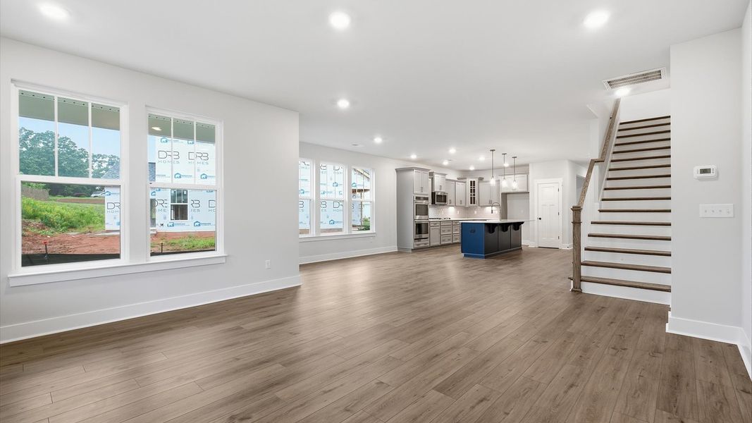 Hardwood flooring and high standards define this vibrant family room ideal for everyday living at a reputable community Hardwood flooring and high standards define this vibrant family room ideal for everyday living at a reputable community