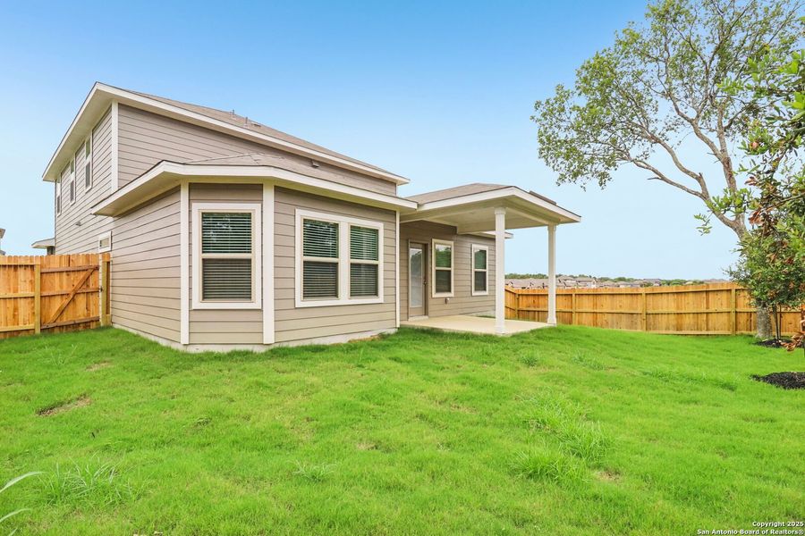 Front exterior of a new home in Royal Crest, San Antonio, TX, highlighting curb appeal (Image 1). Front exterior of a new home in Royal Crest, San Antonio, TX, highlighting curb appeal (Image 1).
