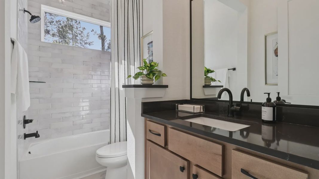 Representative furnished interior of a home built from the Marbella by Chesmar Homes in Audubon, Magnolia (Image 19).