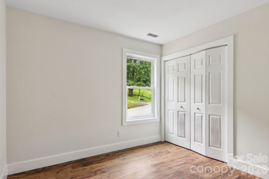 Spacious, unfurnished interior of a new home in , Waynesville (Image 36).