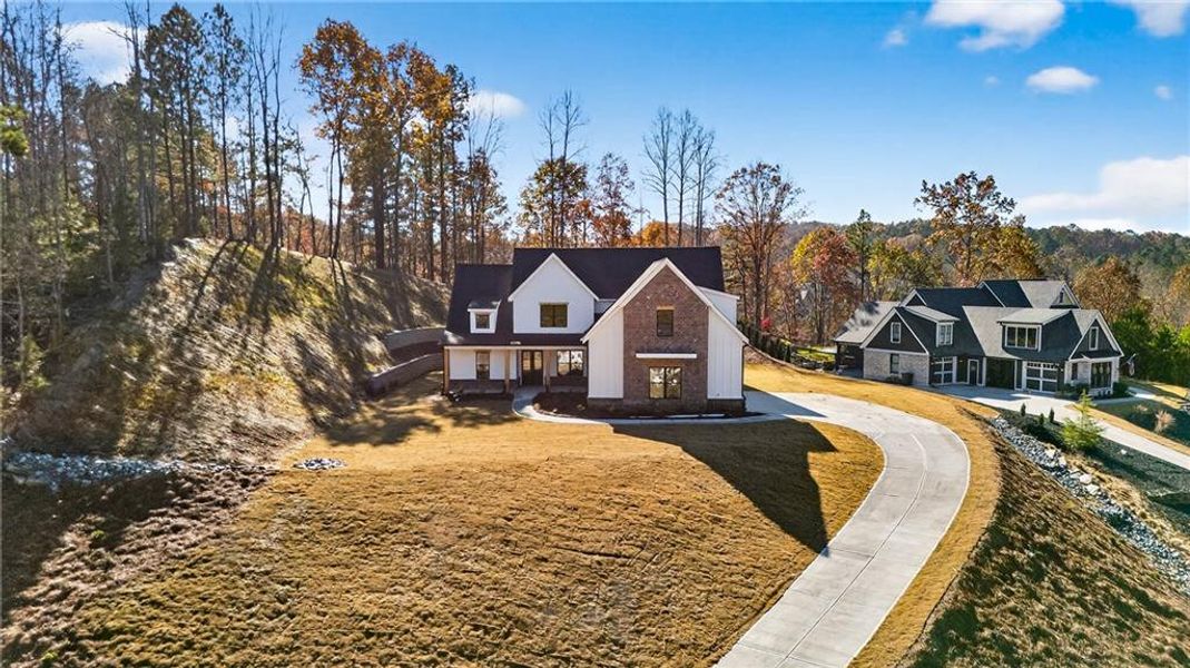 Front exterior of a new home in , Canton, GA, highlighting curb appeal (Image 17). Front exterior of a new home in , Canton, GA, highlighting curb appeal (Image 17).