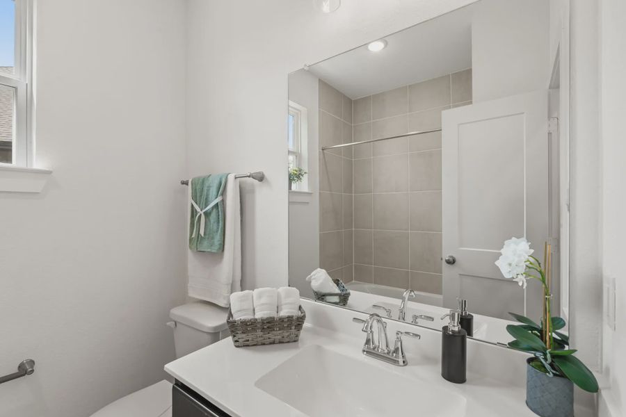 Representative furnished interior of a home built from the Chalet by Chesmar Homes in Meridiana Townhomes, Iowa Colony (Image 17).