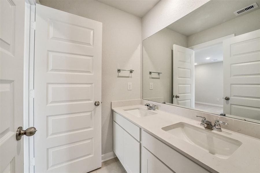 Furnished interior view inside a new home in Lakes at Black Oak, Magnolia (Image 13).