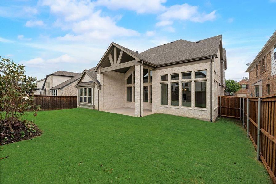 Exterior details and patio area of a home in Frisco Hills, Little Elm (Image 21).