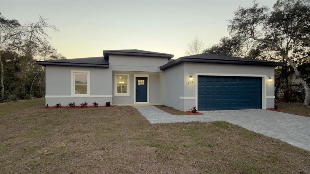 Front exterior of a new home in , Ocala, FL, highlighting curb appeal (Image 16).