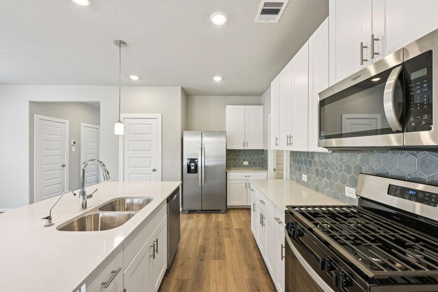 Photo is not of the actual home, but is an inspirational photo of builder’s model home and may depict options, furnishings, and/or decorator features that are not included