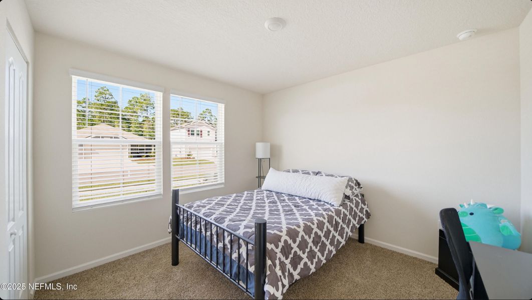 Furnished interior view inside a new home in River Glen Express, Yulee (Image 24).