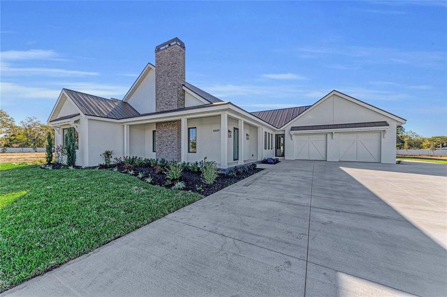 Front exterior of a new home in , Sarasota, FL, highlighting curb appeal (Image 2). Front exterior of a new home in , Sarasota, FL, highlighting curb appeal (Image 2).