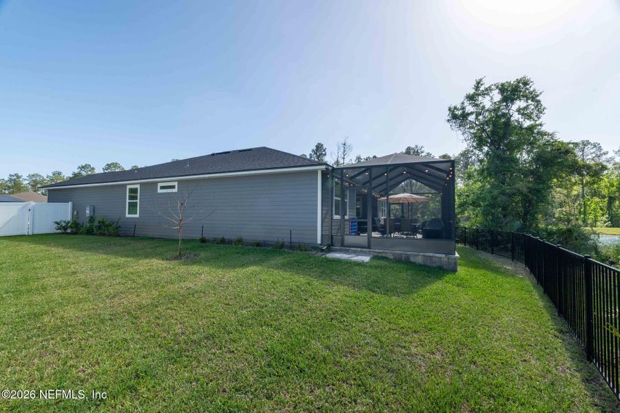 Exterior details and patio area of a home in RiverTown - Settlement, St. Johns (Image 4).