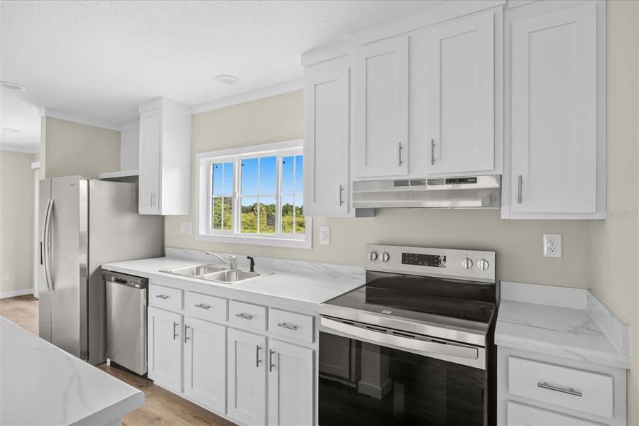 Furnished interior view inside a new home in , Okeechobee (Image 6). Furnished interior view inside a new home in , Okeechobee (Image 6).