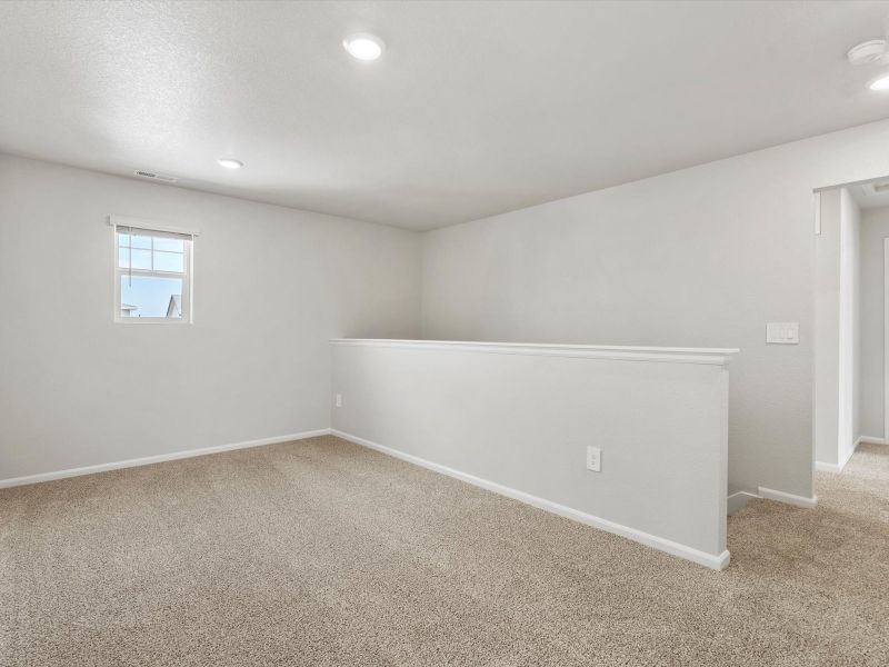 Spacious, unfurnished interior of a new home in Frontier Estates - The Flora Collection, Firestone (Image 10). Spacious, unfurnished interior of a new home in Frontier Estates - The Flora Collection, Firestone (Image 10).