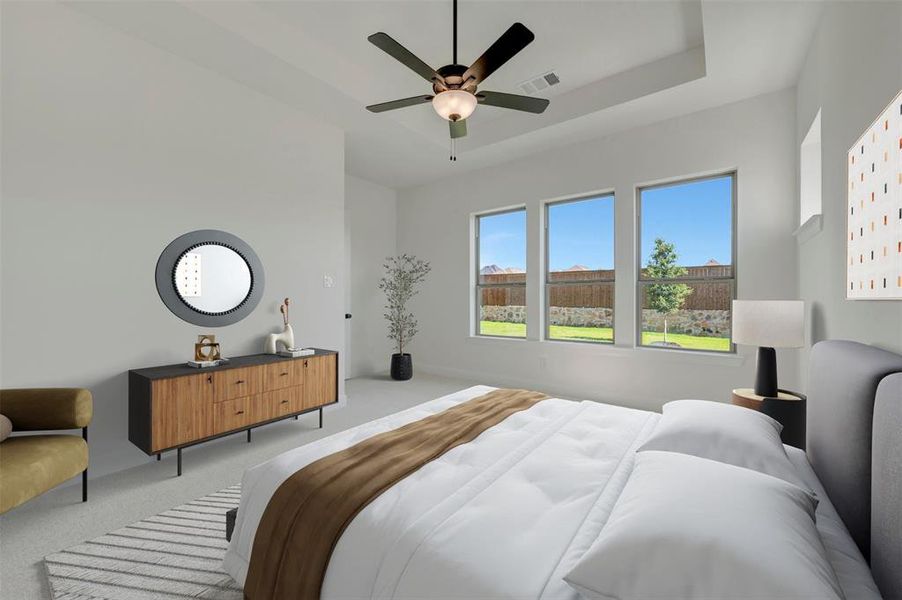 Spacious interior featuring a tray ceiling, ceiling fan with integrated lighting, and three large windows Spacious interior featuring a tray ceiling, ceiling fan with integrated lighting, and three large windows