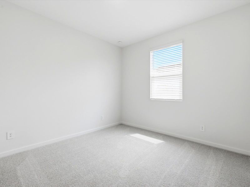Spacious, unfurnished interior of a new home in White Tank Foothills Signature Series, Waddell (Image 15).