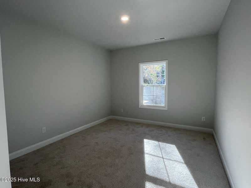 Spacious, unfurnished interior of a new home in Palmetto Creek, Bolivia (Image 27).