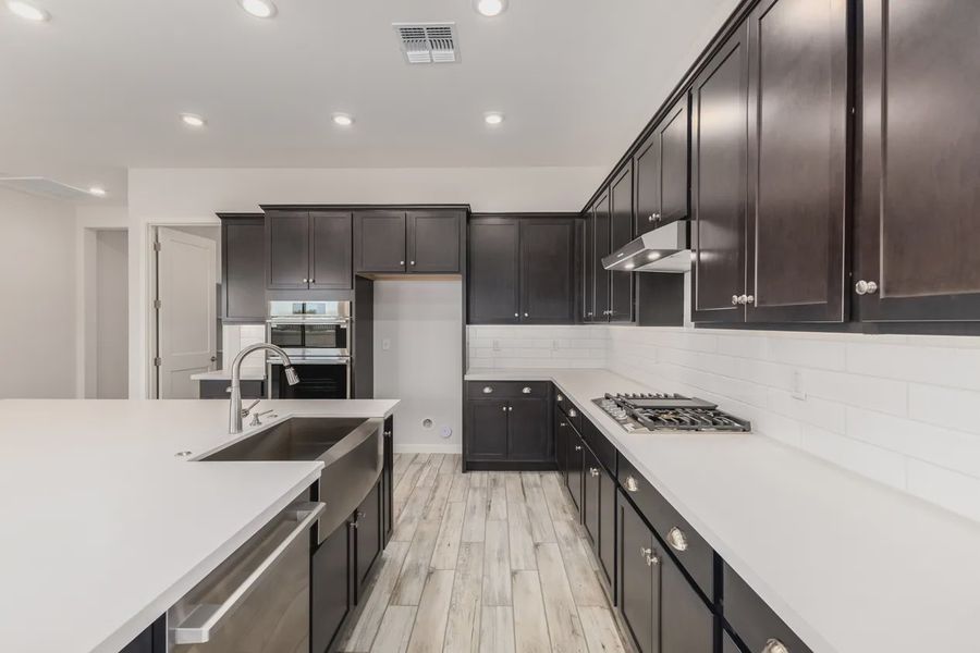 Furnished interior view inside a new home in Valencia at Granite Vista, Waddell (Image 6).