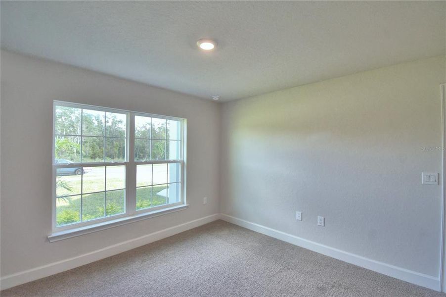 Spacious, unfurnished interior of a new home in Cadence Crossing, Auburndale (Image 50).