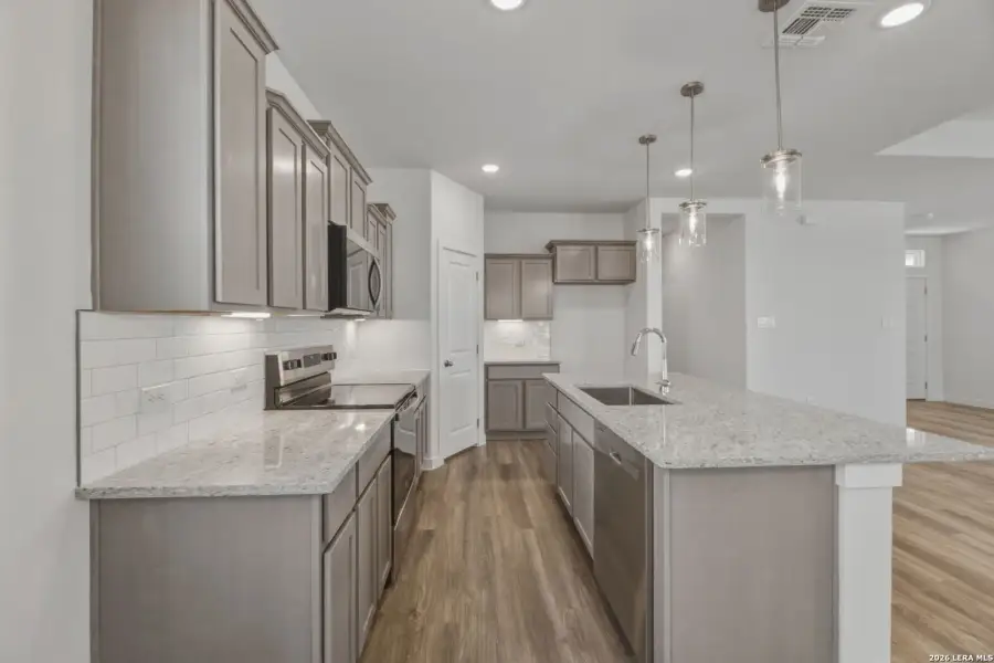 Furnished interior view inside a new home in , San Antonio (Image 8).