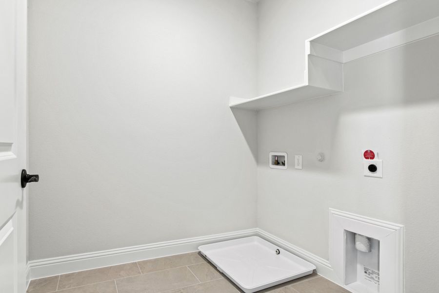 Spacious, unfurnished interior of a new home in The Tribute, The Colony (Image 42).