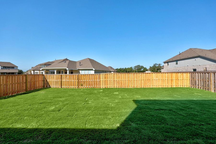 Exterior details and patio area of a home in Parmer Ranch - 60', Georgetown (Image 2).
