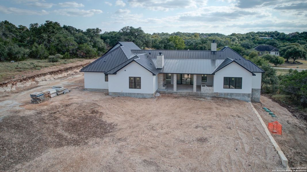 Front exterior of a new home in , New Braunfels, TX, highlighting curb appeal (Image 27). Front exterior of a new home in , New Braunfels, TX, highlighting curb appeal (Image 27).