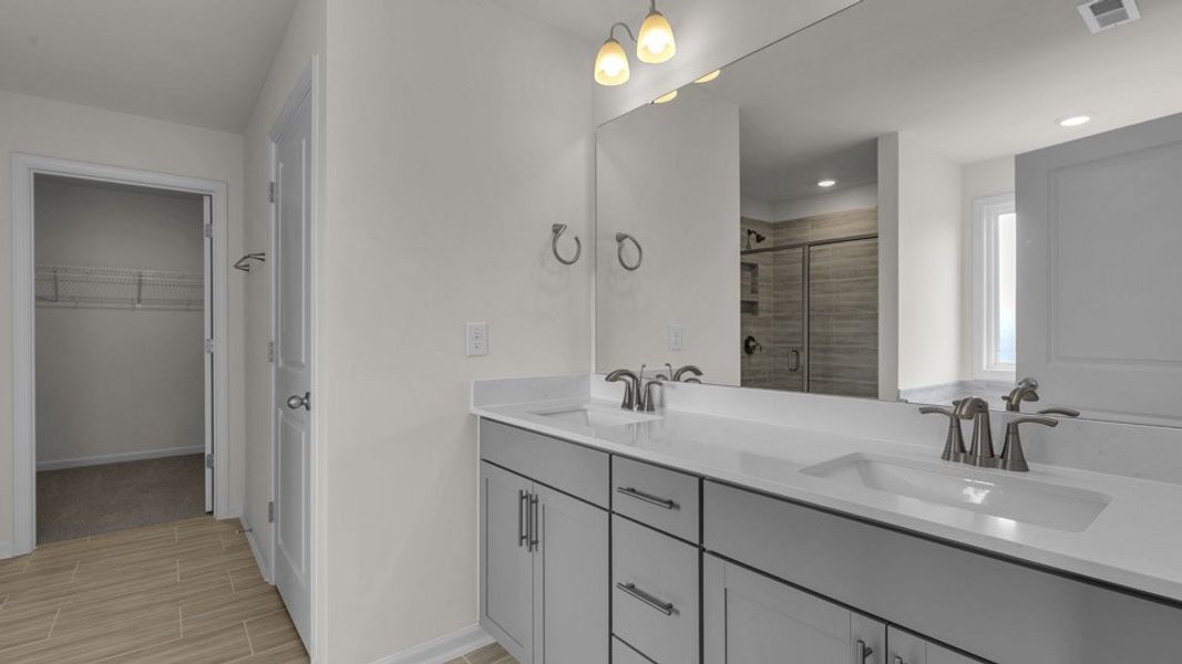 Representative furnished interior of a home built from the EDISTO by D.R. Horton in Eagle Creek, Fuquay Varina (Image 8).
