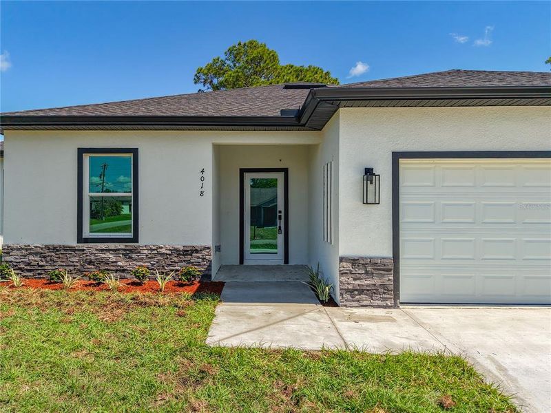 Exterior details and patio area of a home in , Lehigh Acres (Image 26). Exterior details and patio area of a home in , Lehigh Acres (Image 26).
