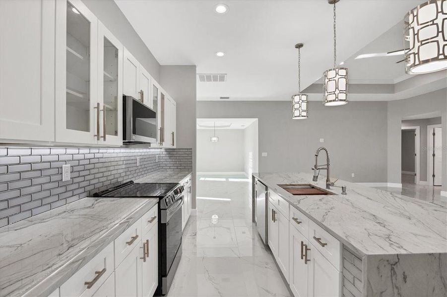 Furnished interior view inside a new home in , Port Charlotte (Image 14).