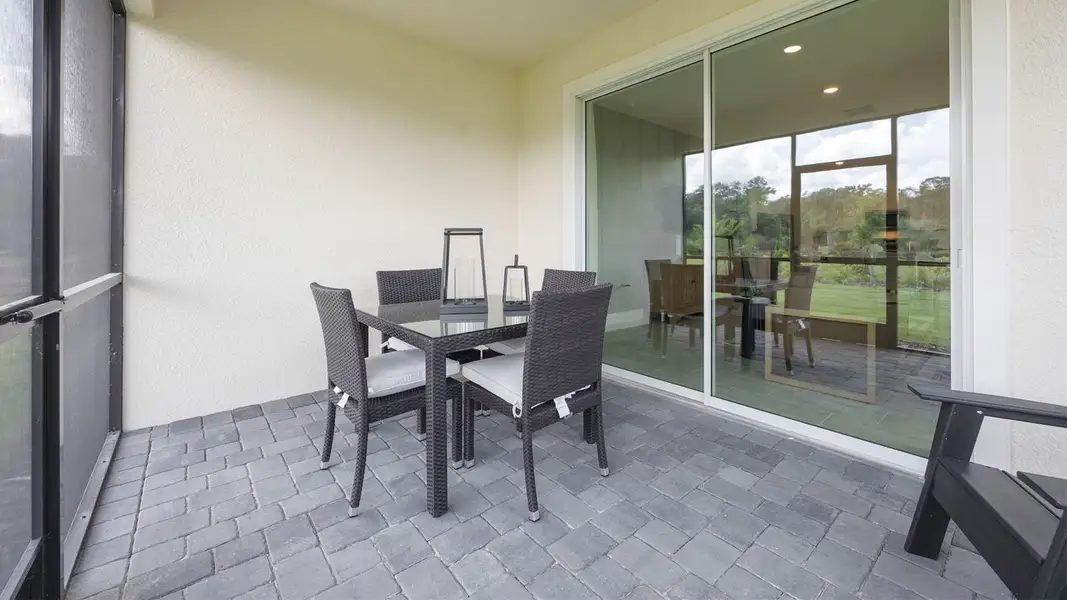 Exterior details and patio area of a home in Lakes of Mount Dora, Mount Dora (Image 4).