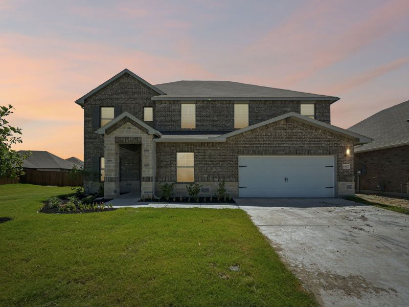 Front exterior of a new home in Lakehaven - Premier Series, Farmersville, TX, highlighting curb appeal (Image 2). Front exterior of a new home in Lakehaven - Premier Series, Farmersville, TX, highlighting curb appeal (Image 2).