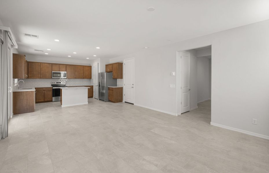 Spacious, unfurnished interior of a new home in Asante- Atrium Series, Surprise (Image 22).